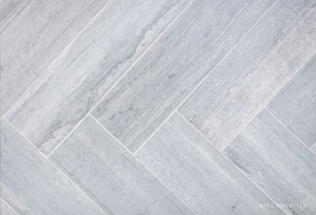 herringbone concrete look tile floor