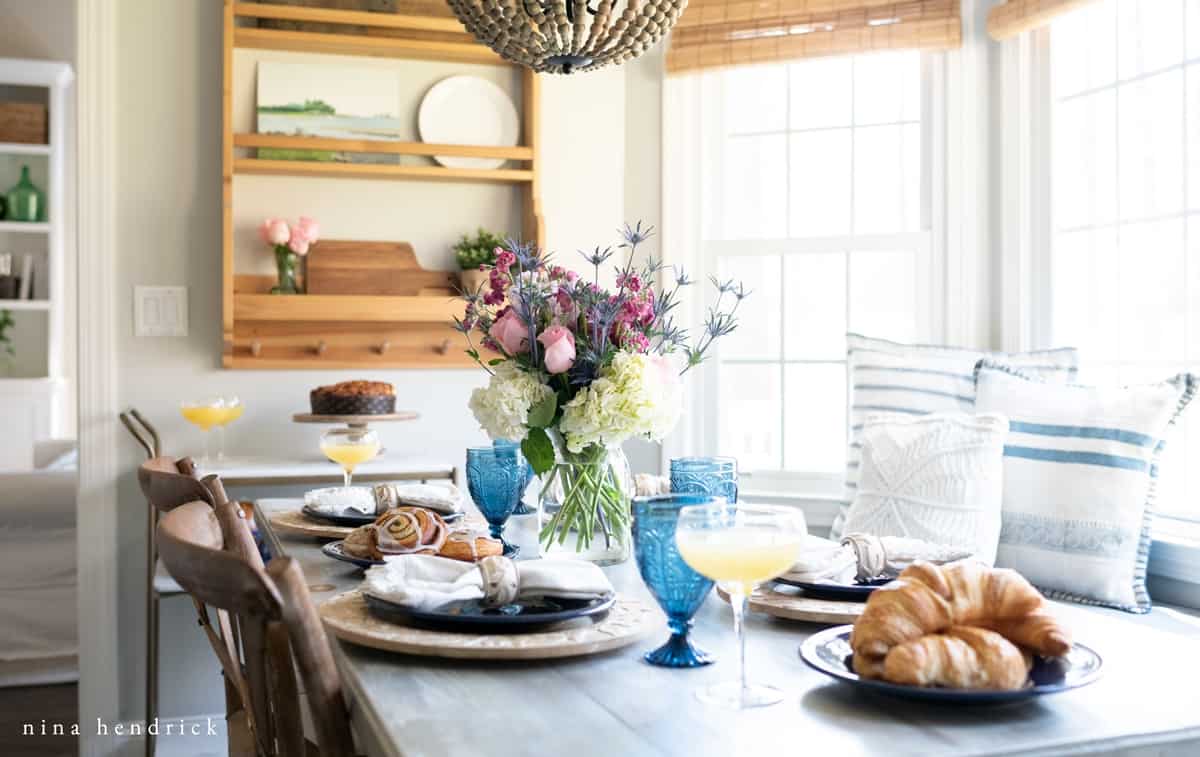 Tablescape with mimosas and blue glasses