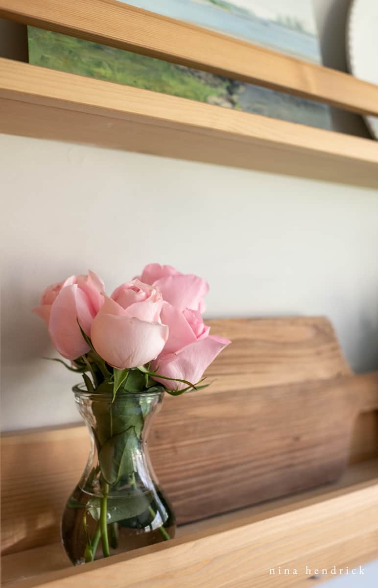 rosebuds on a shelf