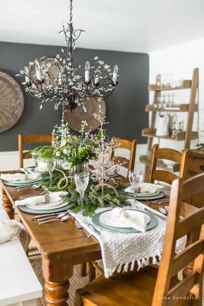 New Year's Eve Tablescape with glittered trees and ribbon