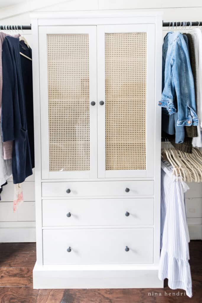 IKEA Hemnes glass cabinet in a closet