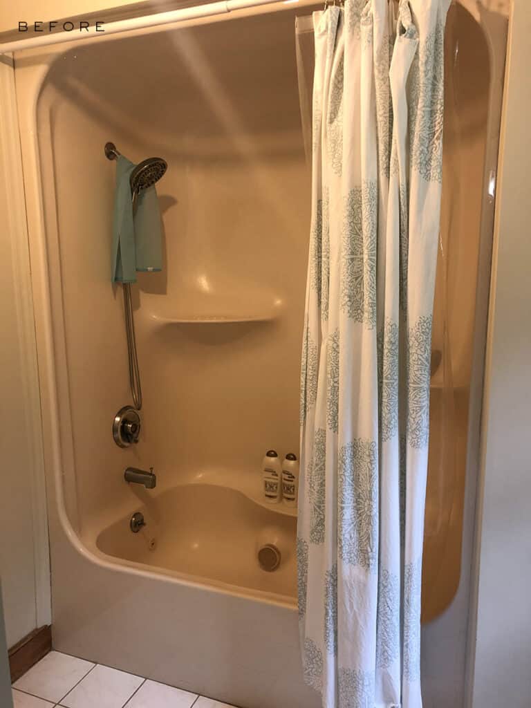 before 1980 builder-beige tub in primary bathroom renovation