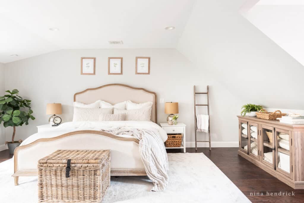 Primary bedroom makeover after: walls are painted Sherwin-Williams Repose Gray lightened by 50%