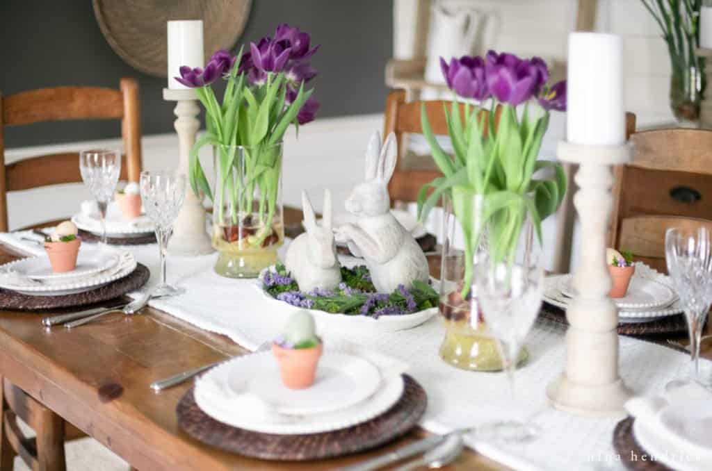 Purple spring tablescape with tulips and bunnies