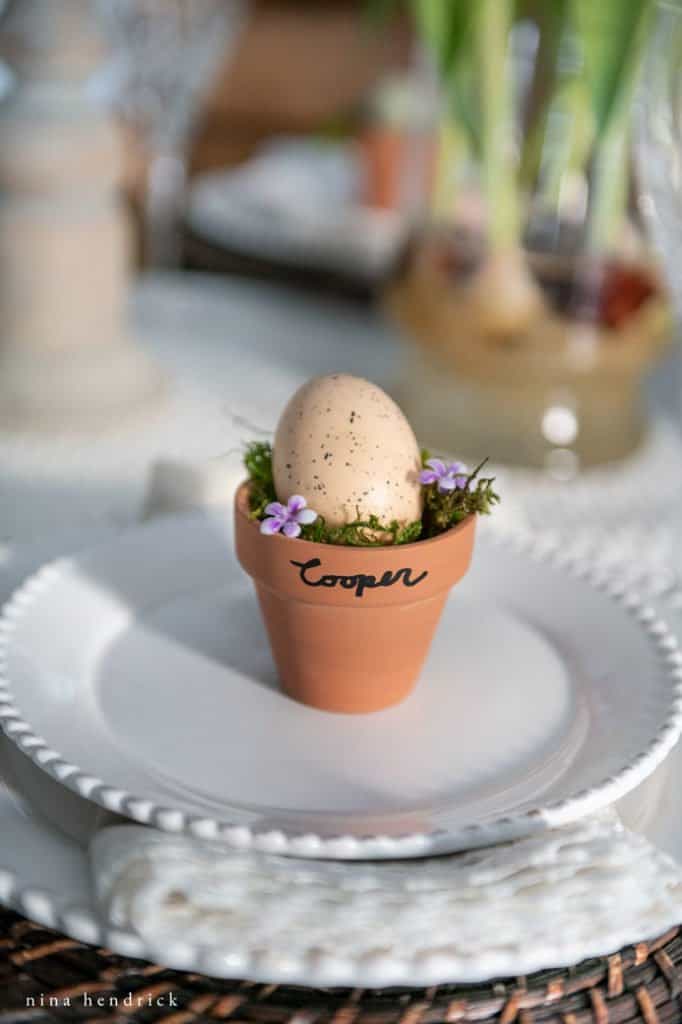 mini clay pot with easter egg as easter placesetting