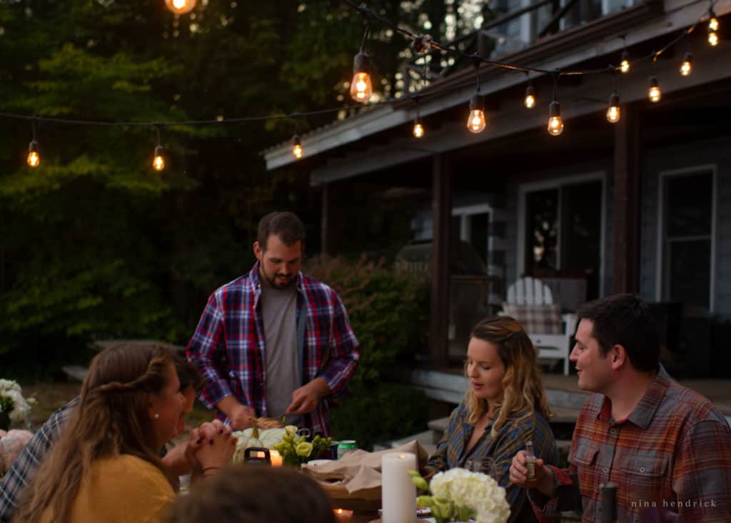 Friends gathered at an outdoor Thanksgiving celebration.