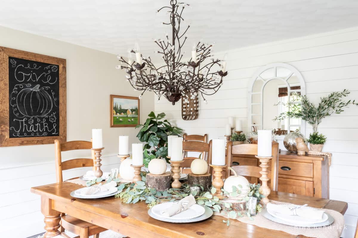 Rustic Thanksgiving celebration in the dining room with white shiplap walls