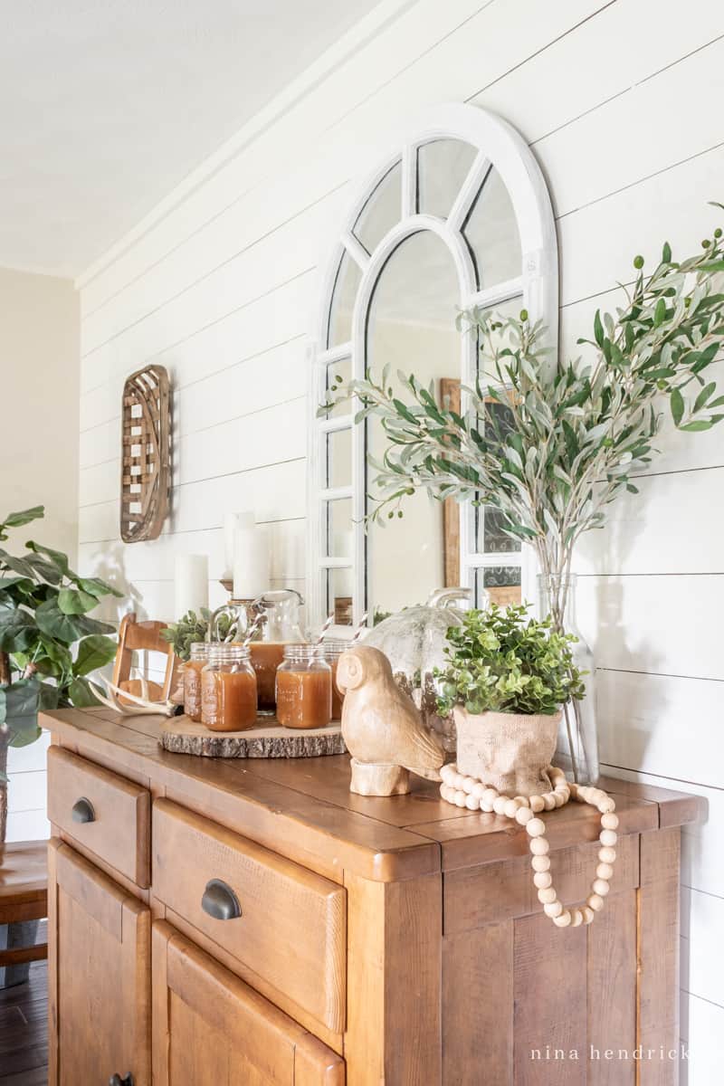 Shiplap wall and buffet set with an apple cider bar