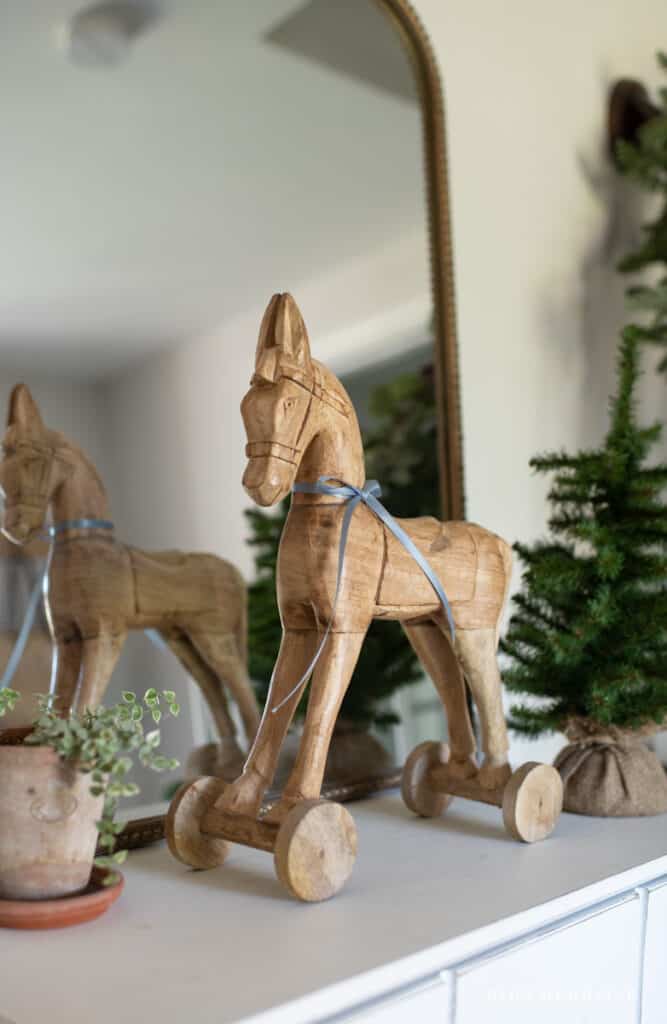 Simple blue ribbon on a wooden horse