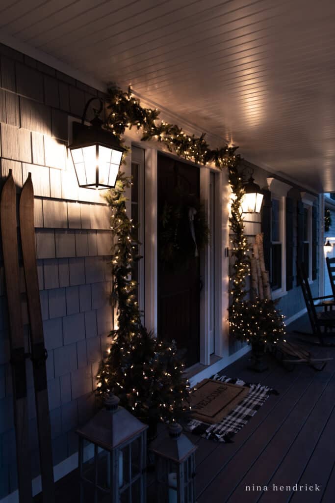Front door with lanterns and Christmas lights
