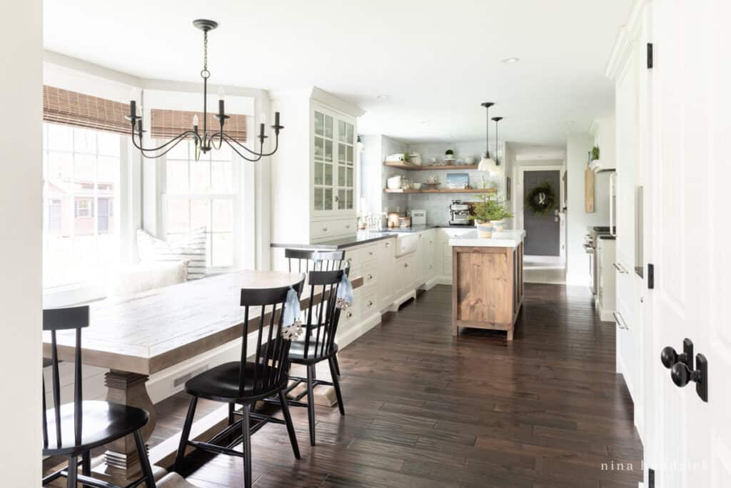 blue Christmas Kitchen decor with Dark wood floors and bright windows | Nina Hendrick Home