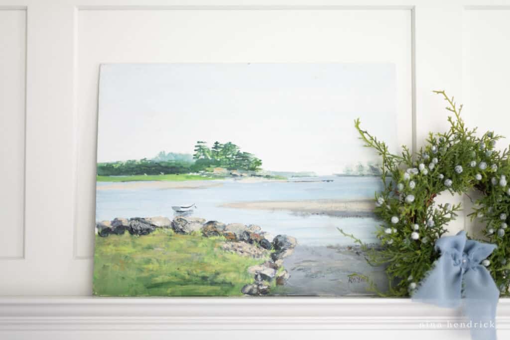 Coastal oil painting with wreath and blue ribbon | Nina Hendrick Home