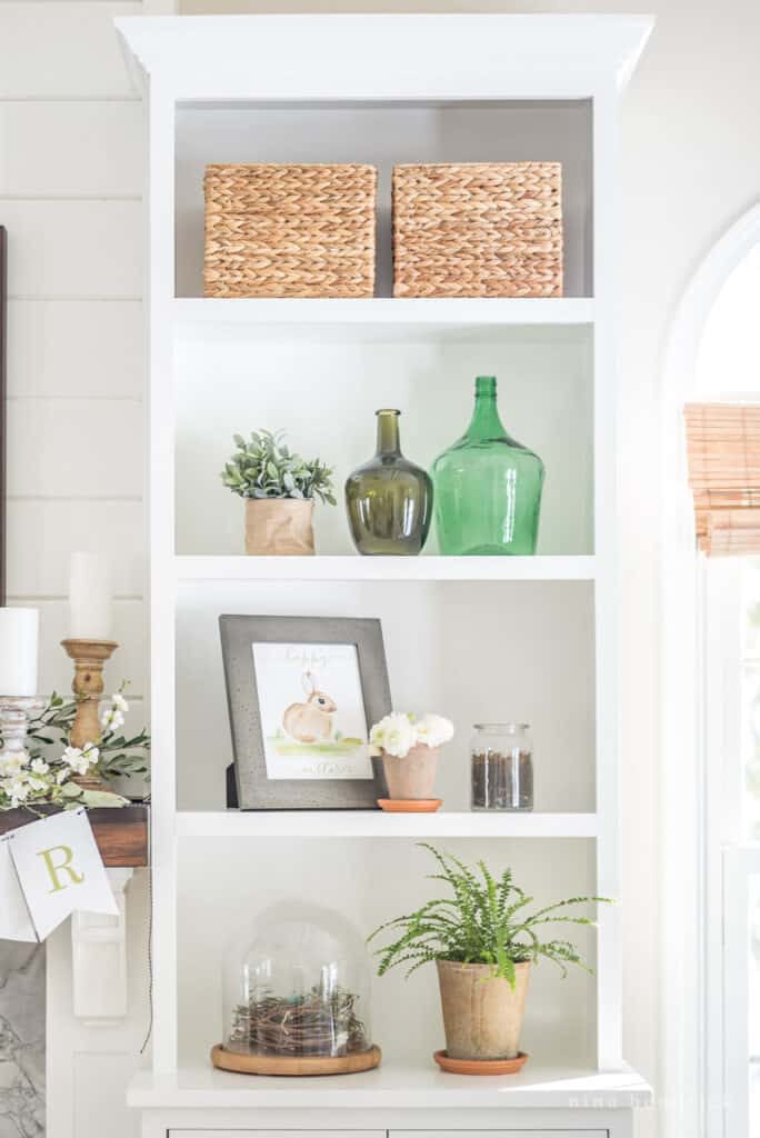 styling shelves with bunny printables and decorative plants