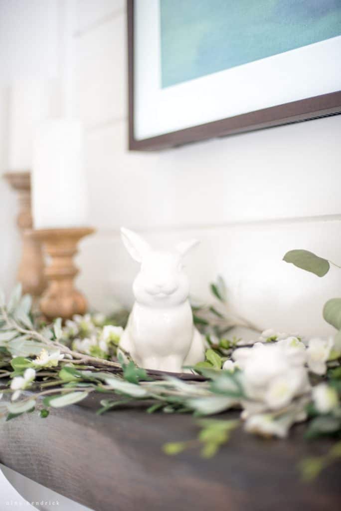 face forward view of ceramic easter bunny on mantel