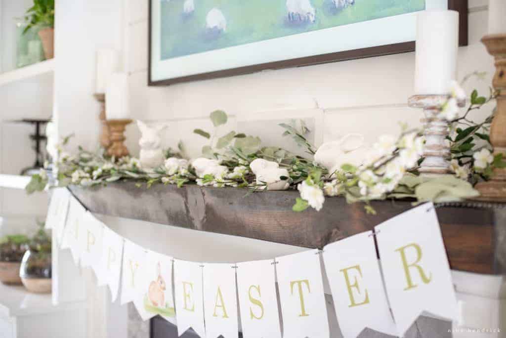 spring mantel with ceramic bunnies and candles decor