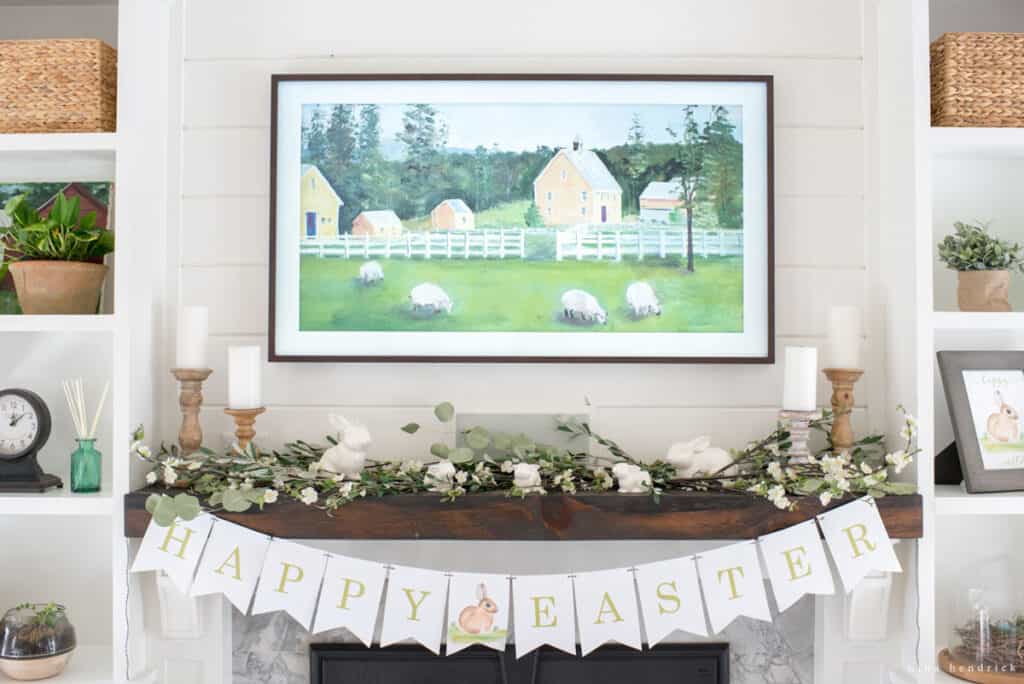 Head on shot of fireplace mantelpiece decorated for Easter with Frame TV