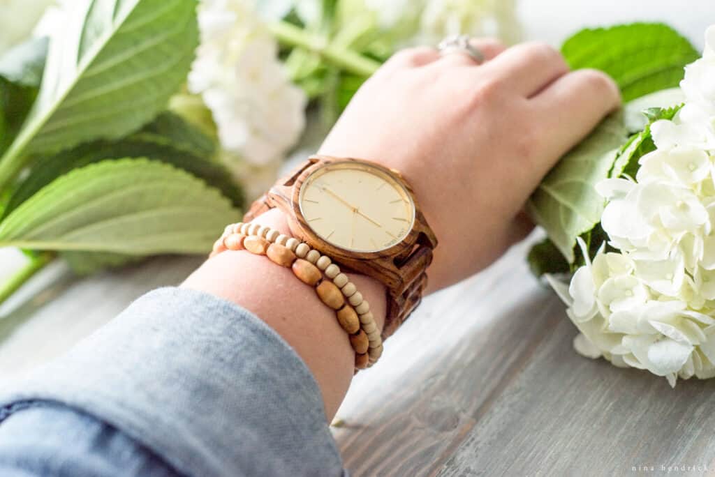 arm with watch and flower 