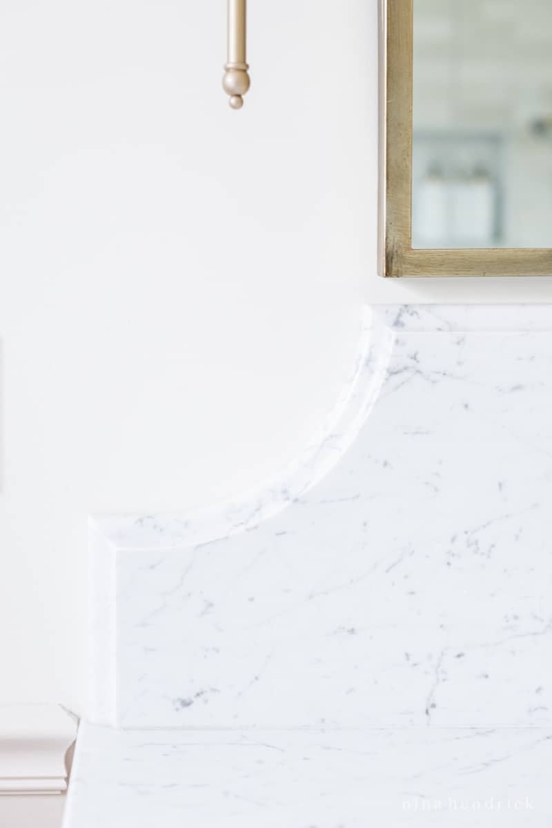 Scalloped marble backsplash detailing 