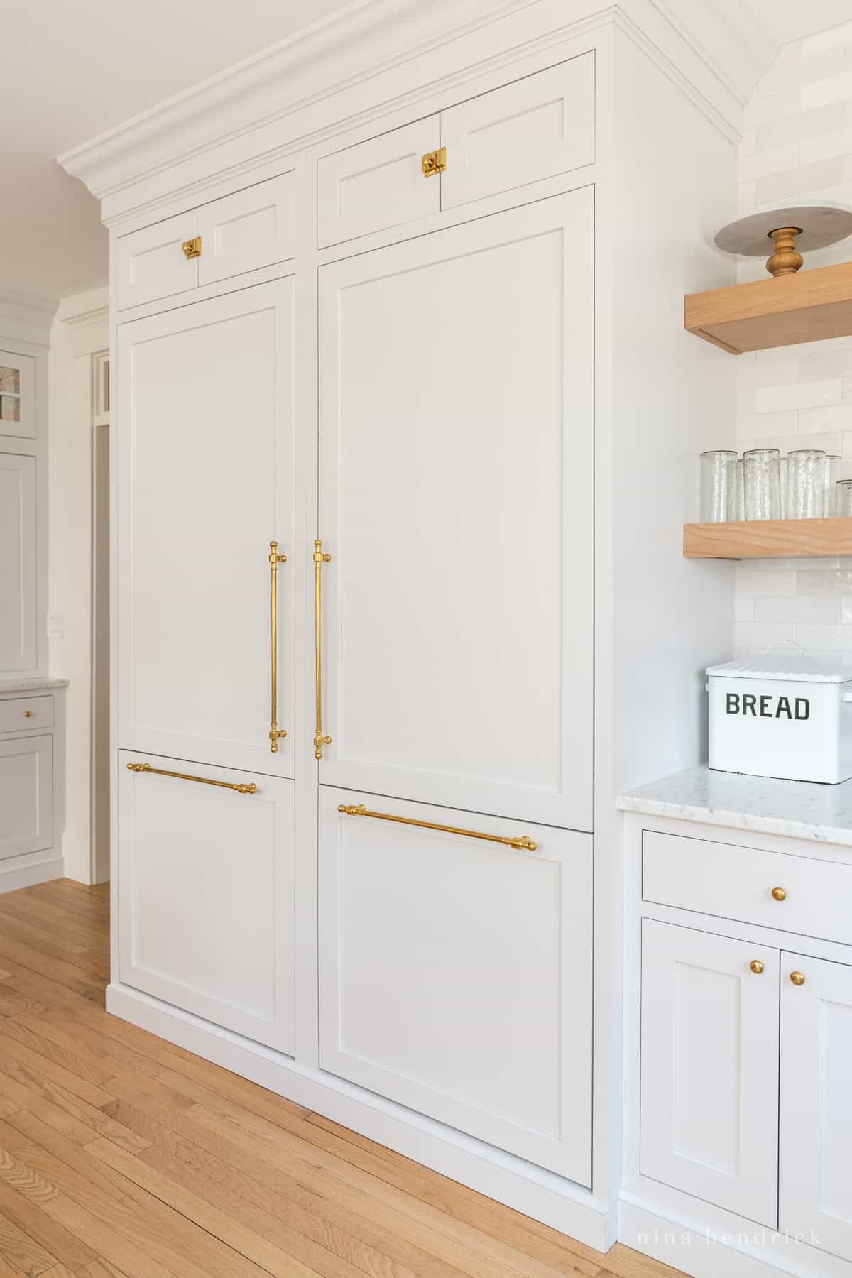 Built-in appliances for a seamless look in a timeless kitchen remodel.