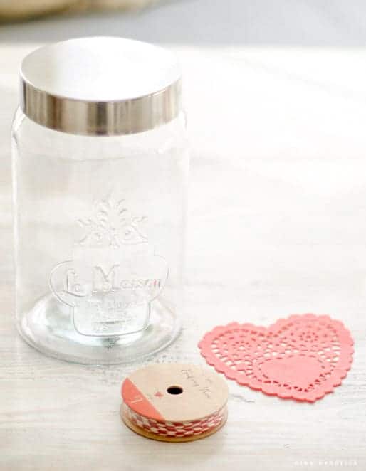 Supplies for DIY Valentine's Day candy cookie mix gift idea — jar, paper doily, red twine