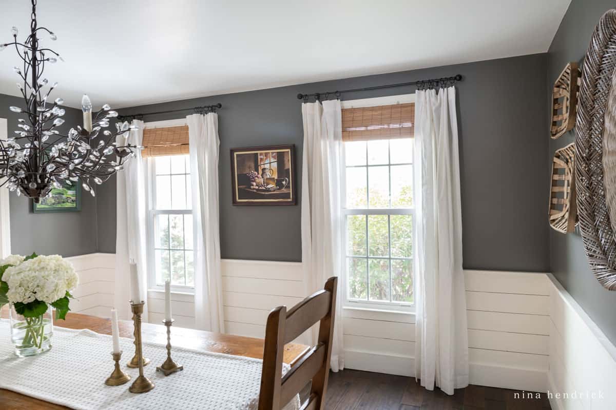 Dining room with planked wainscoting and a chair rail