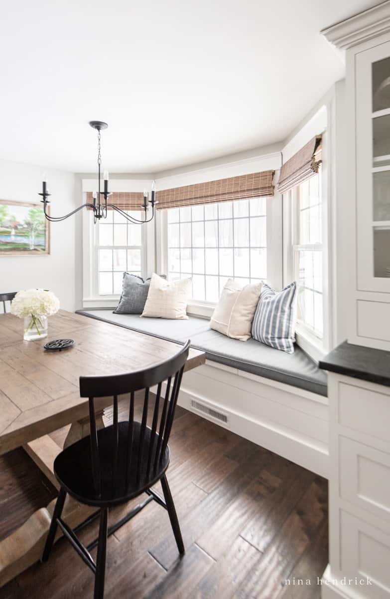 Built-in bay window bench with cushion and planked front