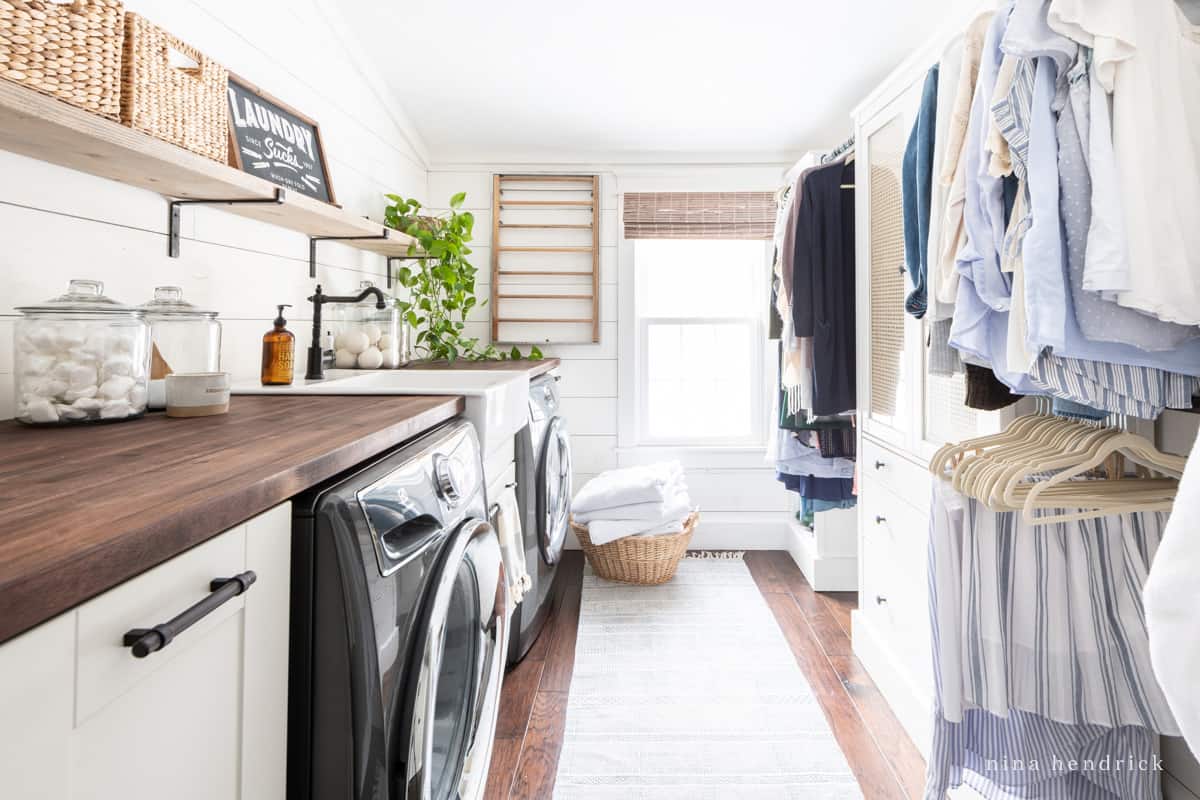 Laundry room and closet with faux shiplap planked wall treatment