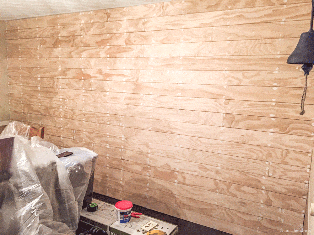 Raw plywood in shiplap wall pattern