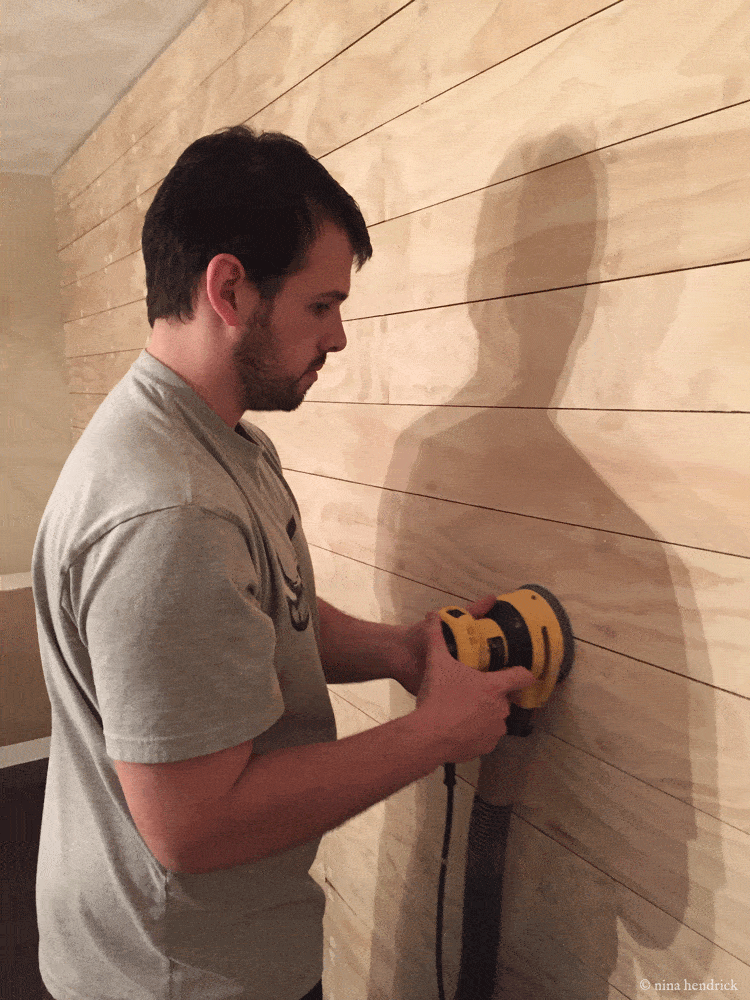 Sanding shiplap wall