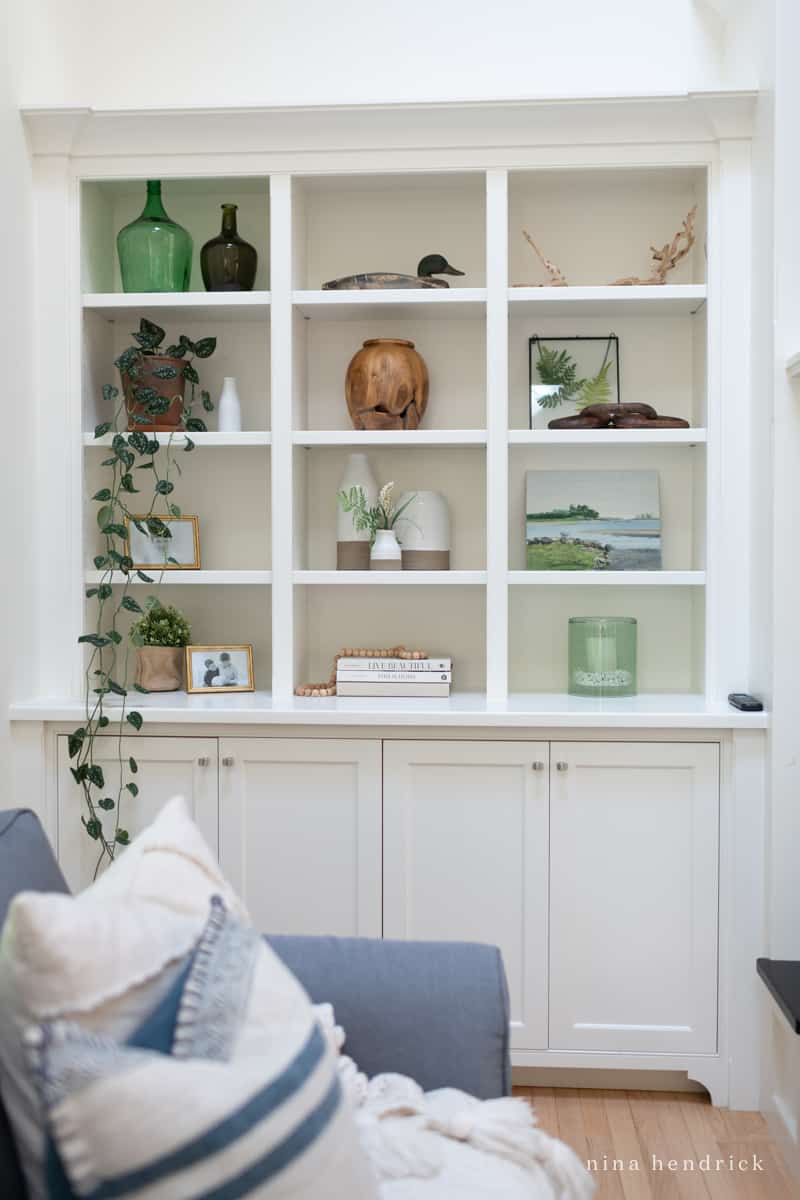 Built-in shelves with neutral decor that feels fresh for any season