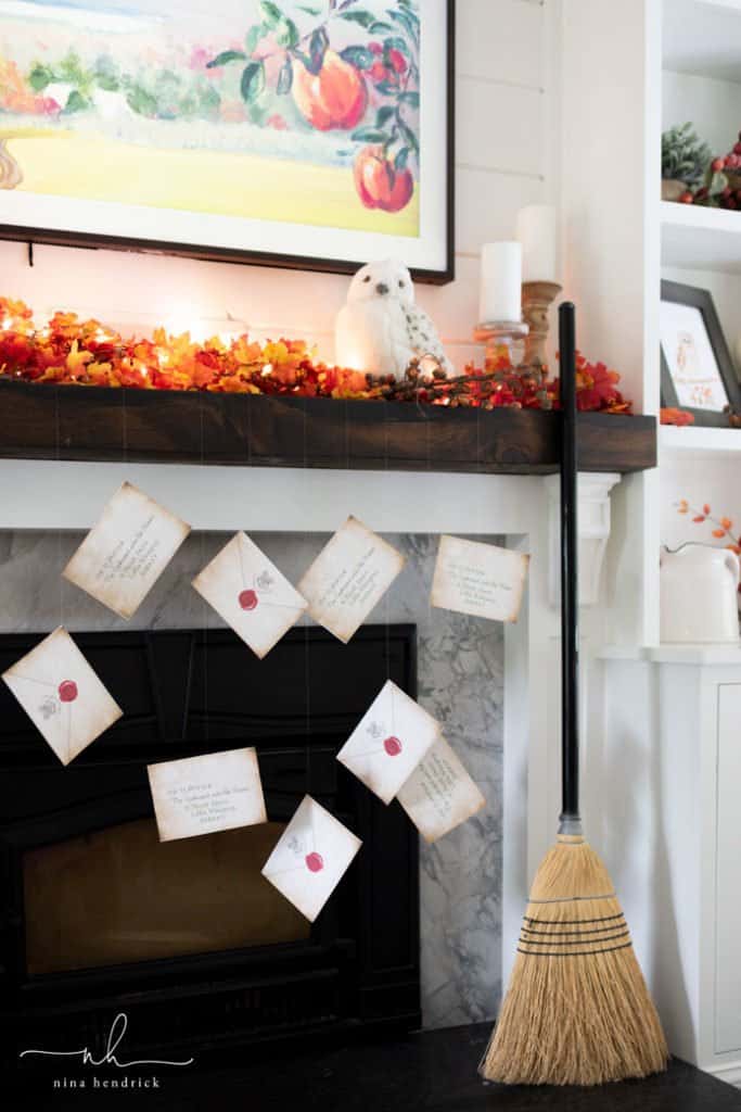 harry potter themed mantle with free printable wizard school acceptance letters