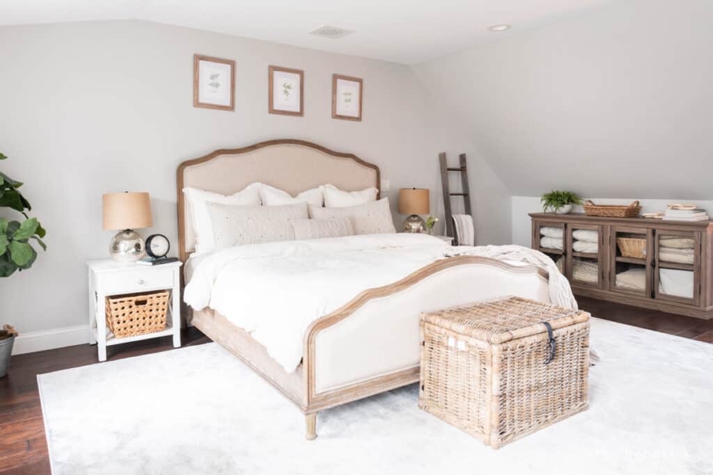 Neutral Bedroom with cream rug and wicker baskets