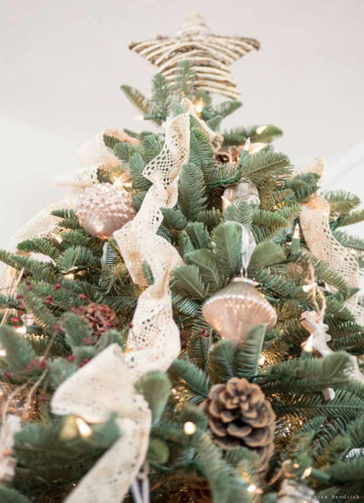 Vintage-style ornaments decorating a Christmas tree